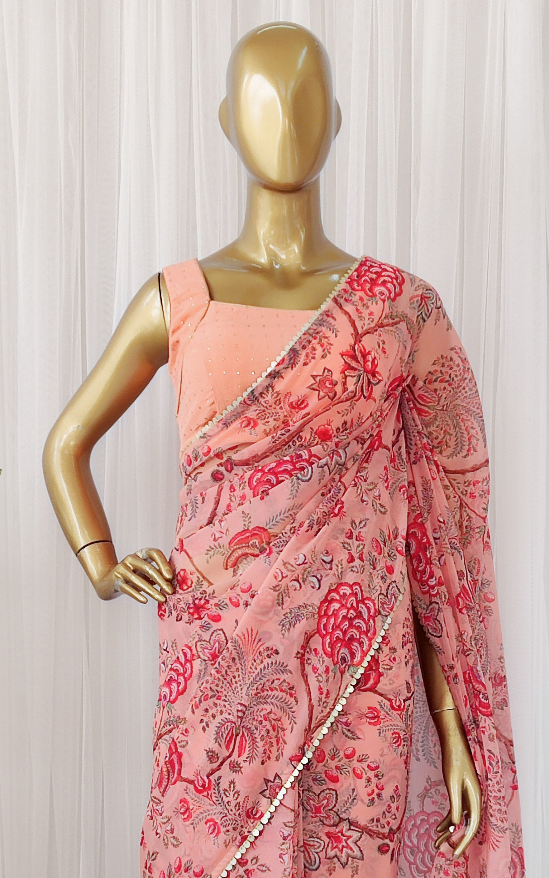 Peach Floral Georgette Saree with Mukaish Blouse