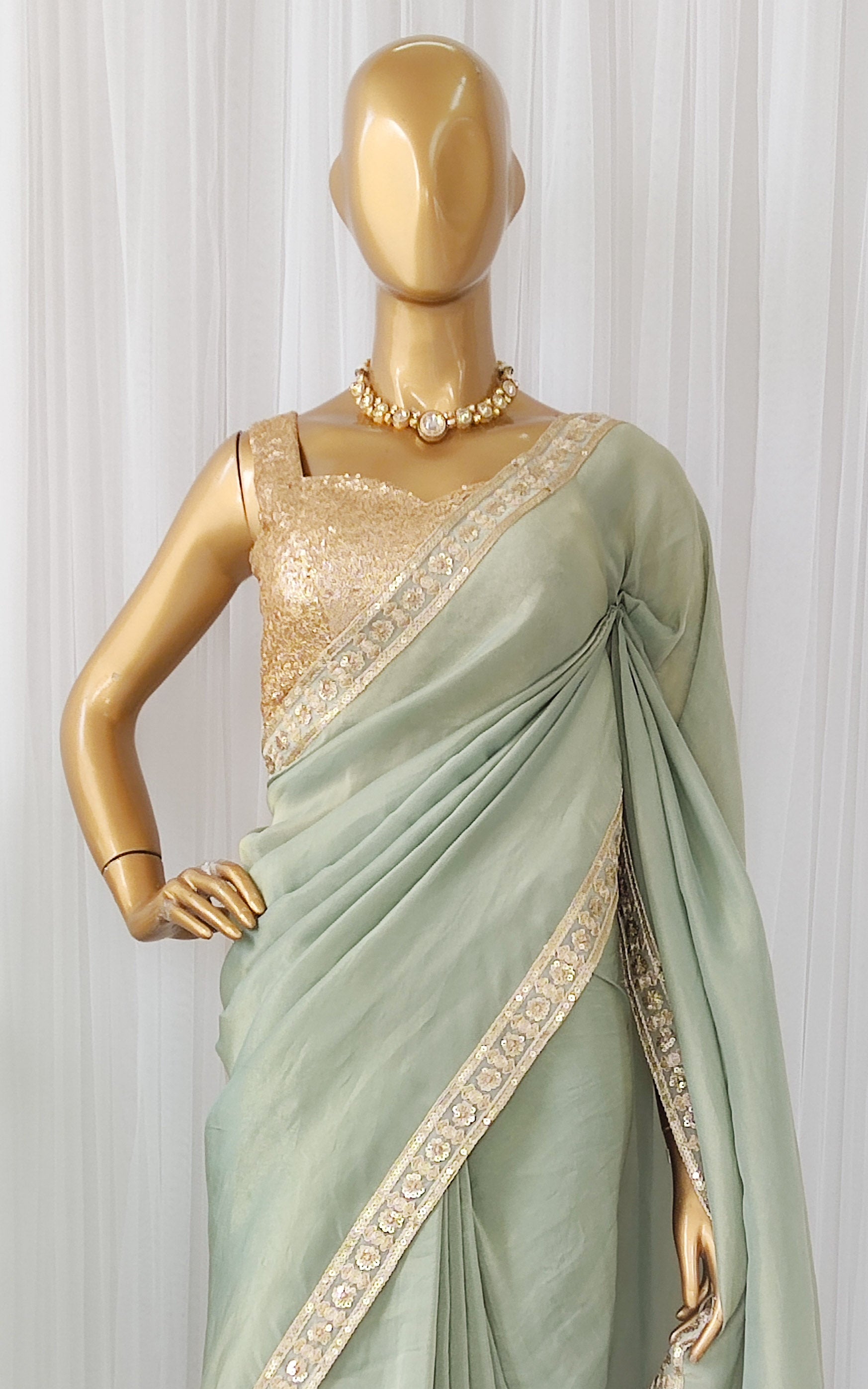 Seafoam Green Tissue Georgette Saree with Gold Sequinned Blouse