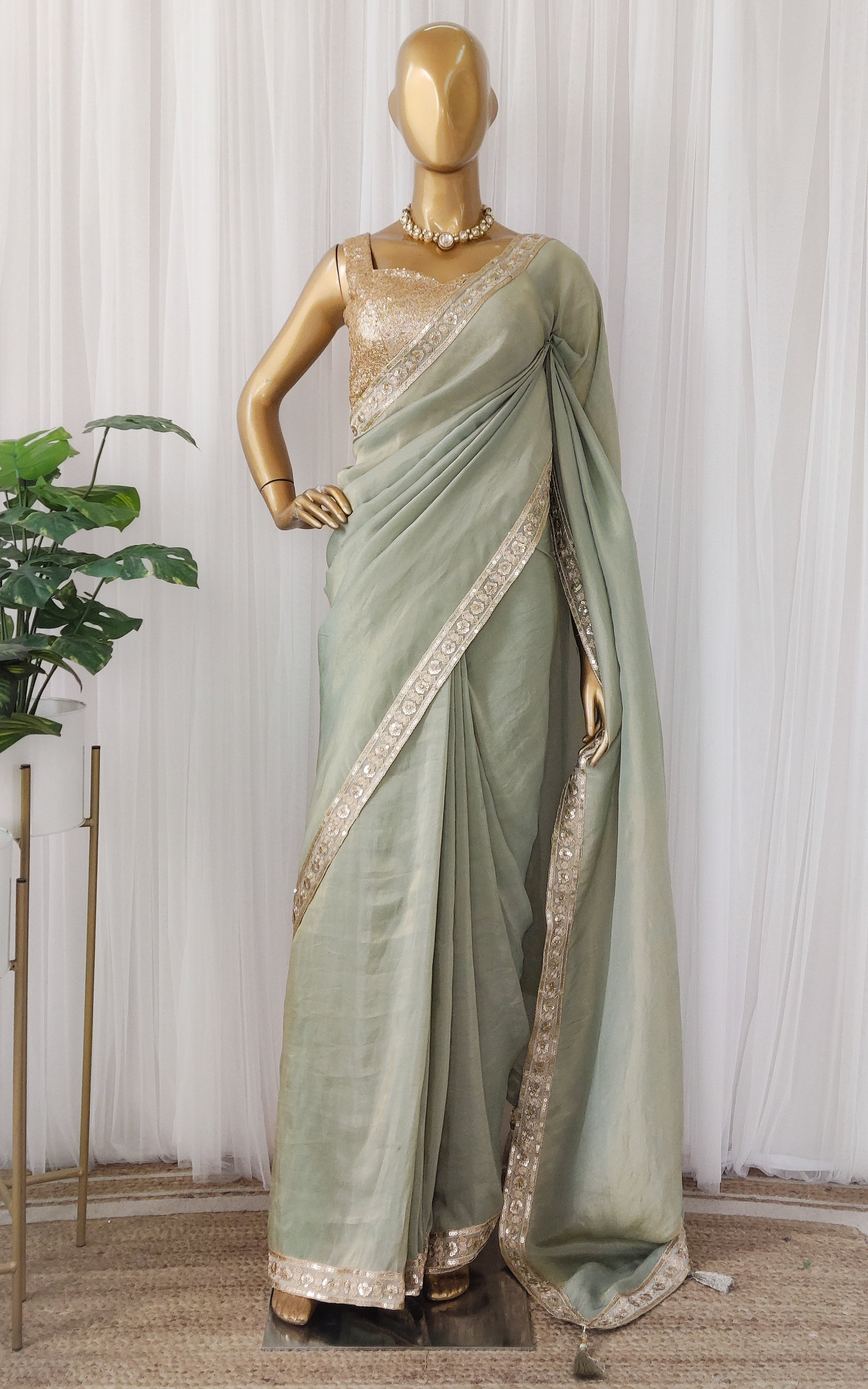 Seafoam Green Tissue Georgette Saree with Gold Sequinned Blouse