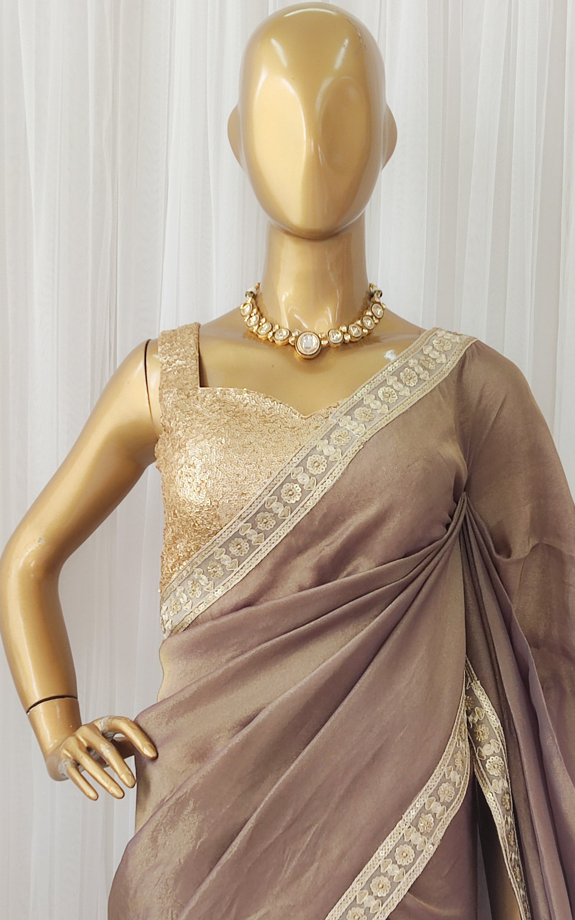 Brown Tissue Georgette Saree with Gold Sequinned Blouse