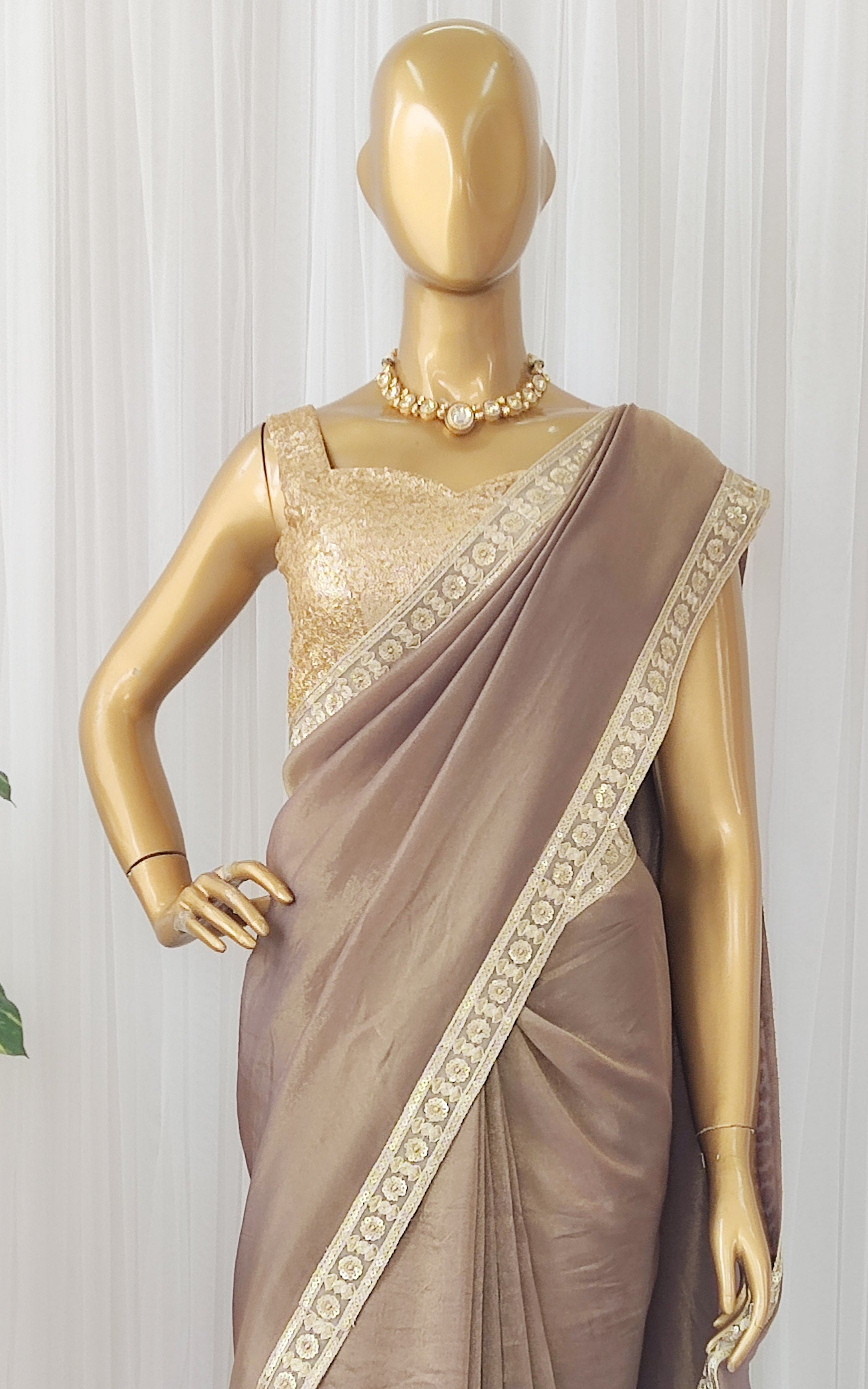 Brown Tissue Georgette Saree with Gold Sequinned Blouse