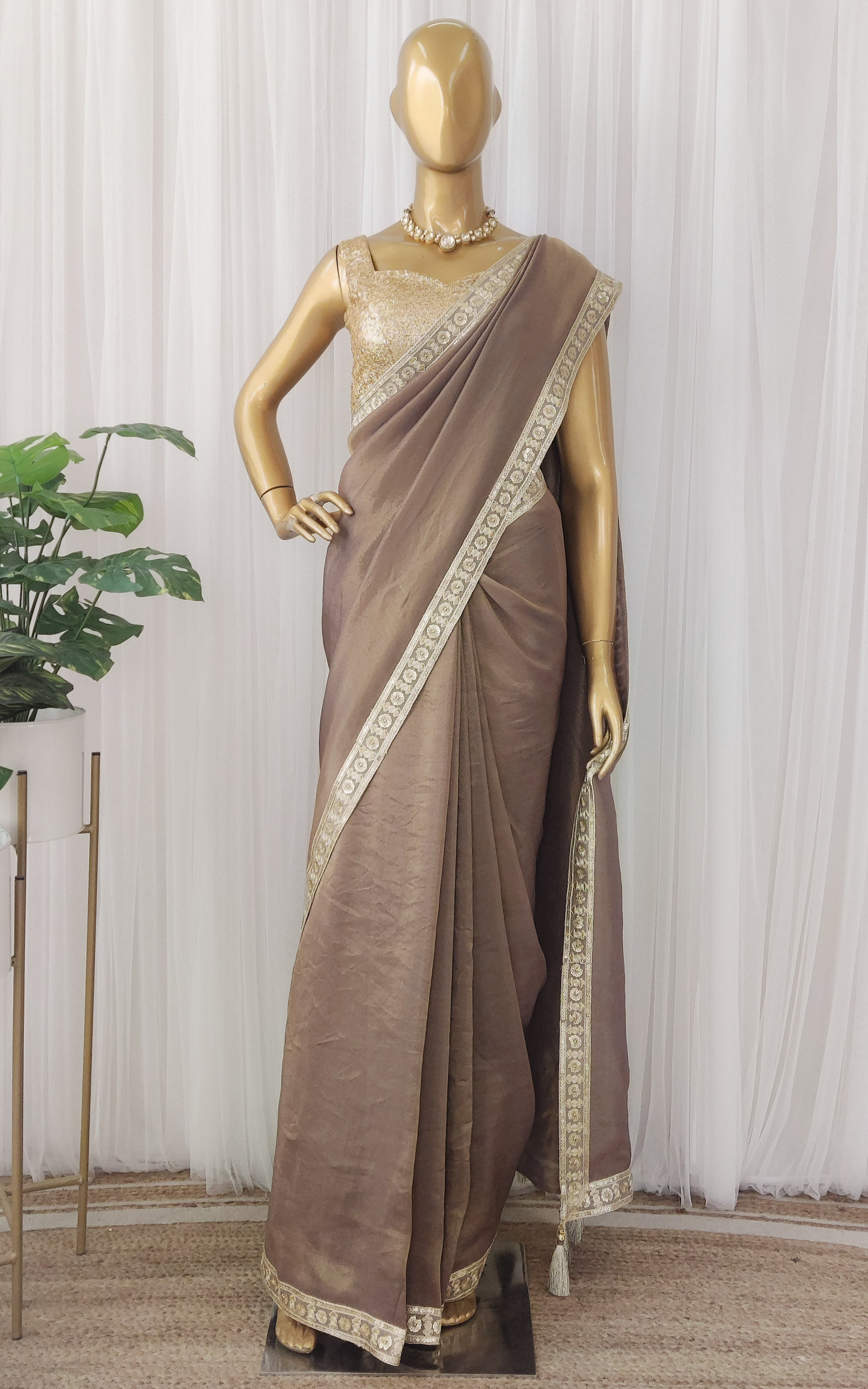 Brown Tissue Georgette Saree with Gold Sequinned Blouse