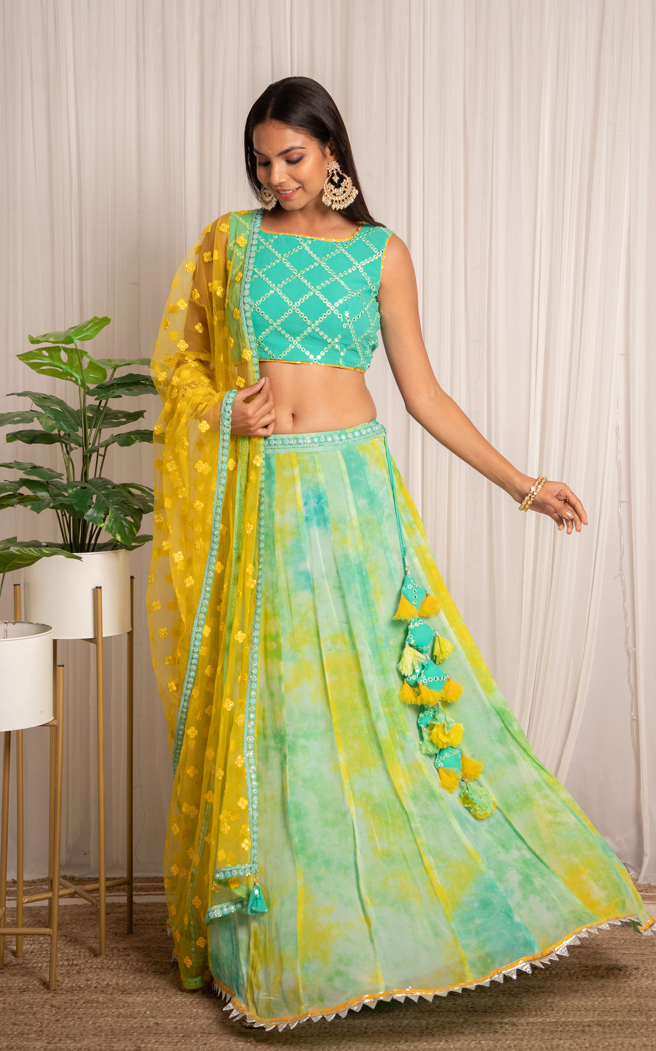 Photo of Sea Blue and Yellow Twirling Lehenga | Lehenga color combinations,  Mehendi outfits, Dress for haldi function